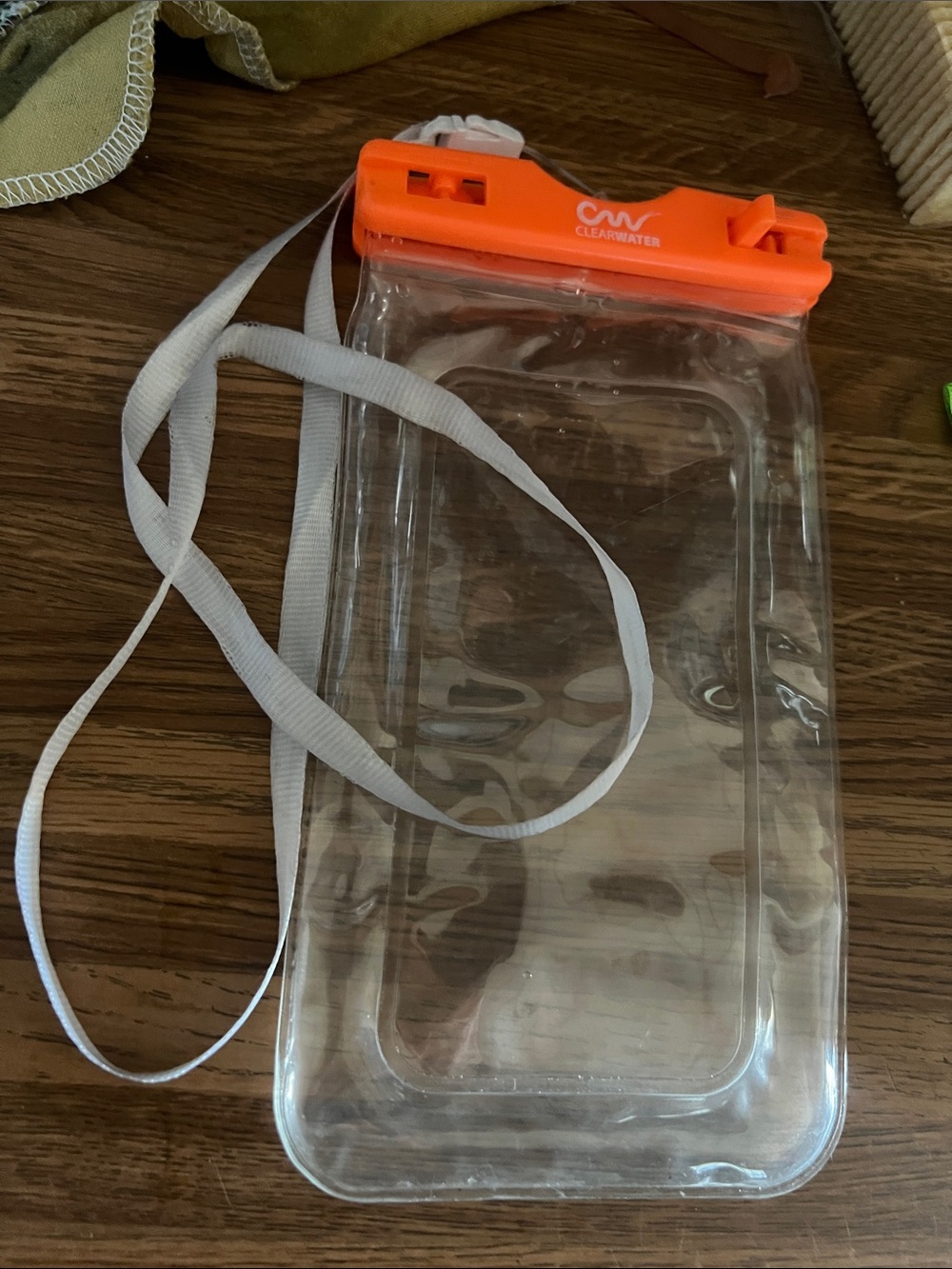 Clear Waterproof Phone Pouch with Orange Lock and White Lanyard - Clearwater